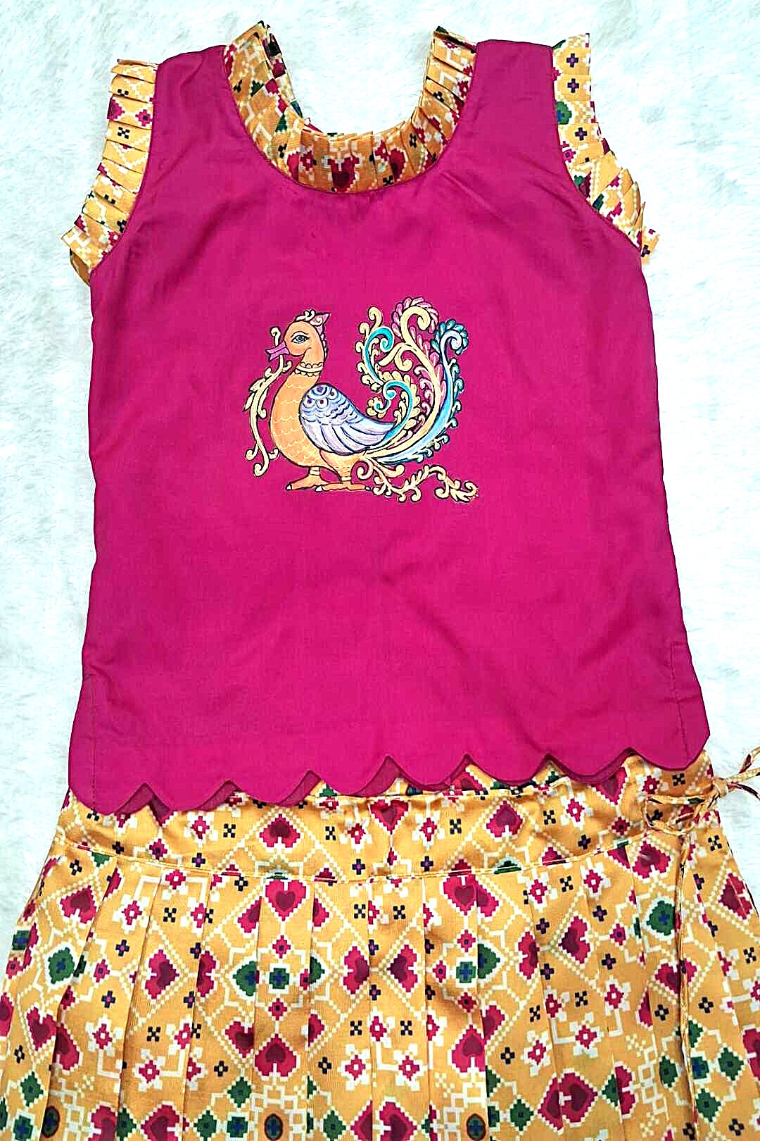 Hand-Painted Ethnic Pattu Pavadai Set – Pink & Yellow