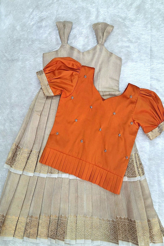 Elegant Orange Blouse with Cream Zari Skirt Set