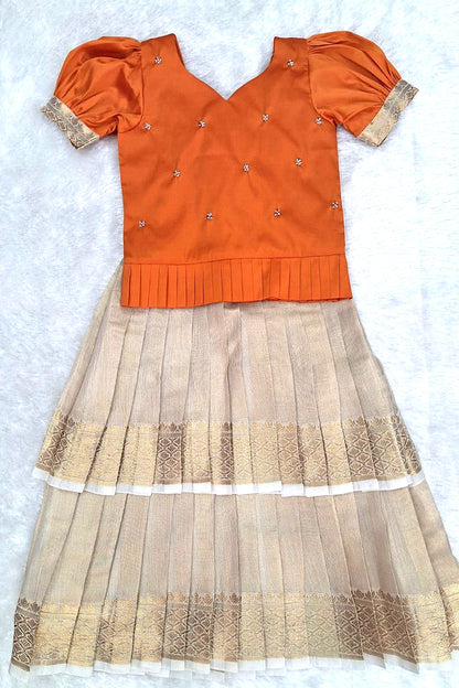 Elegant Orange Blouse with Cream Zari Skirt Set